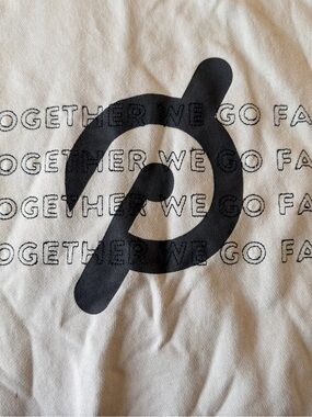 Peloton Cream Sweatshirt with Black Logo Tag